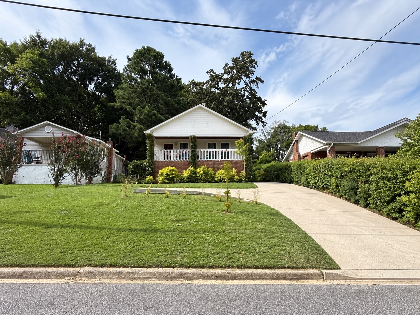 Front lawn and full driveway after maintenance